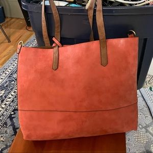 Salmon colored suede tote with smaller purse inside